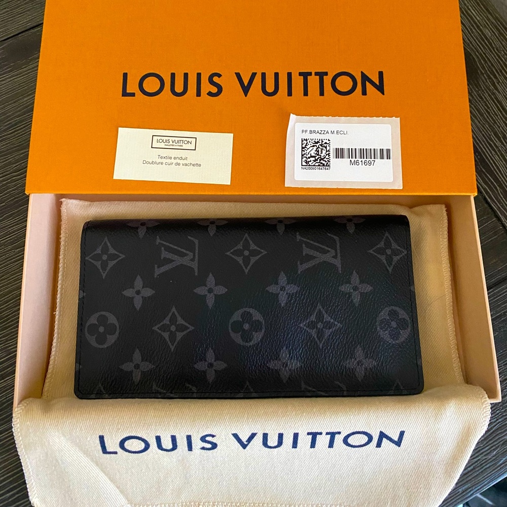 Louis Vuitton Black Monogram long wallet.